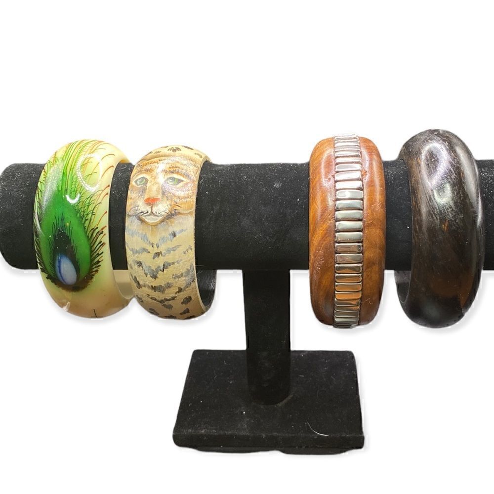 Set of 4 bracelets two wood one dark, one  metal inlay, wood leopard peacock